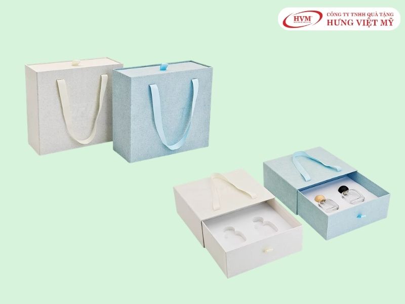 Mẫu hộp quà có quai xách đựng nước hoa dây ruy băng