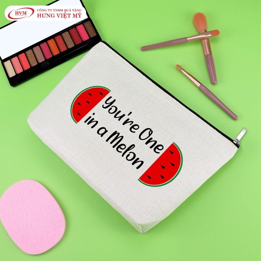 Túi đựng mỹ phẩm vải canvas in slogan You're One in a Melon