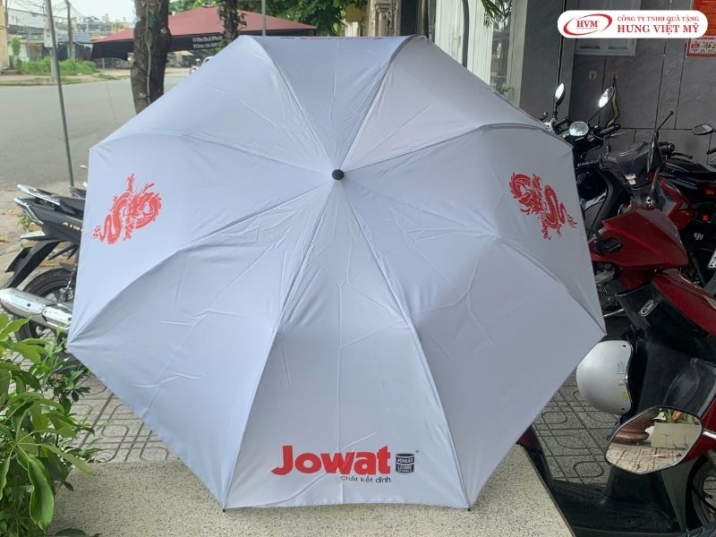 Ô dù cầm tay gấp 3 chống lật in logo, giải pháp quà tặng sự kiện doanh nghiệp che nắng mưa hiệu quả.